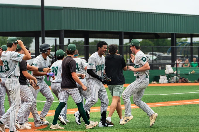 Dallas College Brookhaven baseball players celebrate Friday as the Bears punched their ticket to the district championship Saturday at Dallas College Eastfield. 