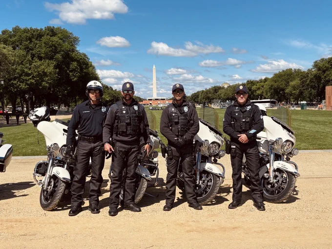 Officers smiling at the camera