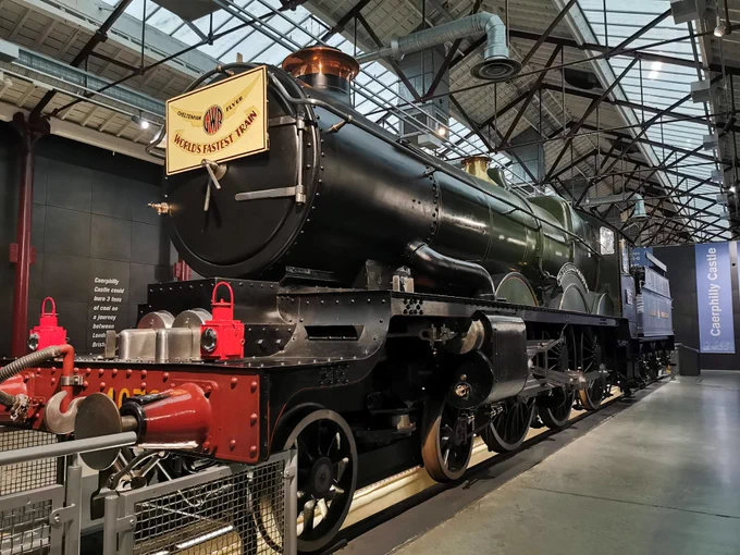 An image of a locomotive at the STEAM Museum in Swindon. There is a sign on the front which reads: “Cheltenham Flyer, World’s Fastest Train”.