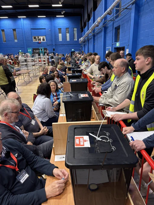 The line of ballot boxes