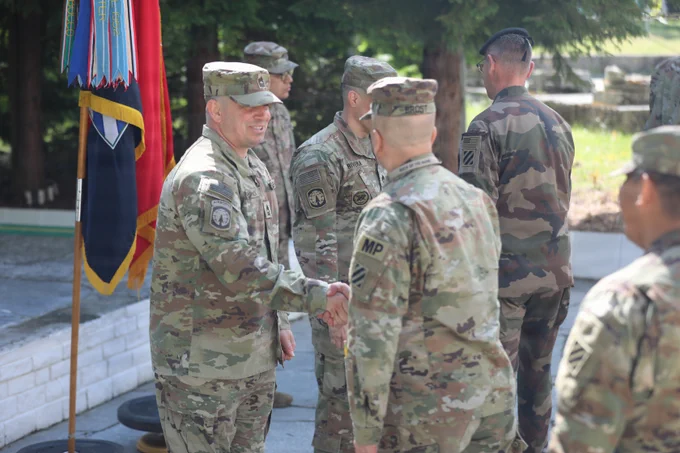 Master Sgt. Michael Jenkins receives congratulations following a coin ceremony.