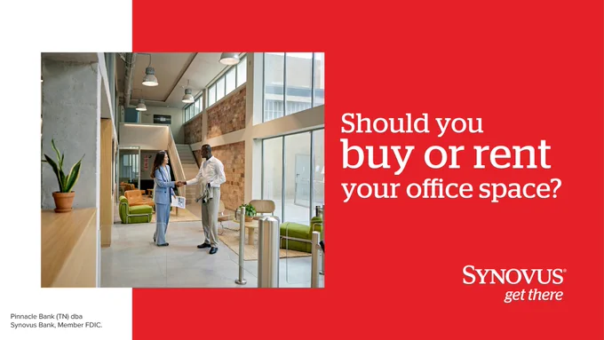 A modern office lobby with two individuals standing and conversing. The space features large windows, green chairs, and a few potted plants. The right side of the image has a red background with the slogan "Should you buy or rent your office space?" and the Synovus logo.