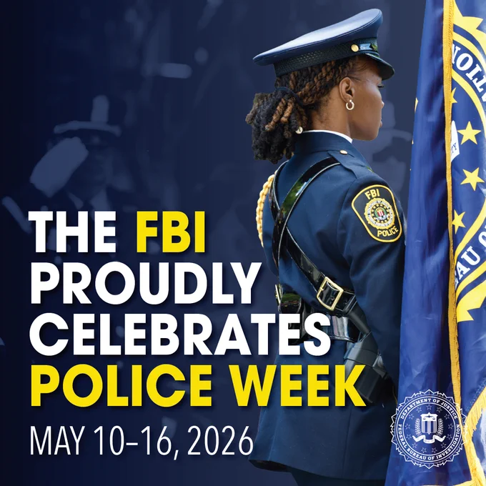FBI officer in formal uniform holding a flag during Police Week celebration from May 10-16, 2026.