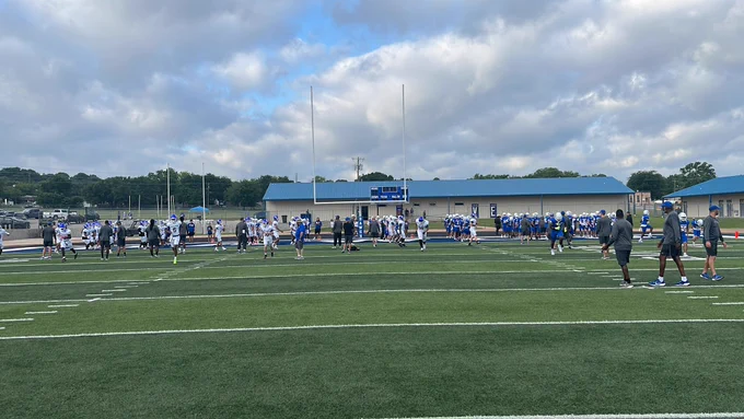 Cove Football warming up before their Spring Game