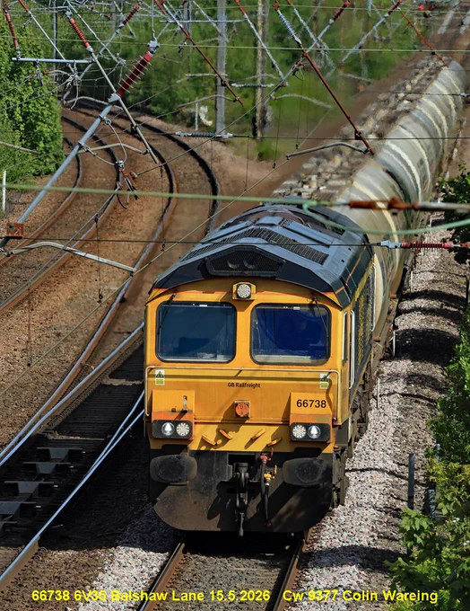 66738 6V35 Balshaw Lane 15.5.2026
GBRf locomotive no 66738 running along the fast lines at Balshaw Lane Junction on the West Coast Main Line on 15.5.25.
GBRf is G B Rail Freight 
The train it is hauling is train of loaded cement tankers from the Castle cement works at Clitheroe in Lancashire to Avonmouth near Bristol.
This train left Clitheroe at 08.25 hrs on this Friday morning to arrive in Avonmouth at 18.42 hrs.  It is running under the head code or train reporting no 6V35. 
Balshaw Lane junction is between Preston and Wigan and is where the slow lines through Euxton Balshaw Lane station regain the fast lines.
15.5.26 
Image Cw 9377 copyright Colin Wareing of Colin and Carole’s Creations
www.colinandcarolescreations.co.uk

