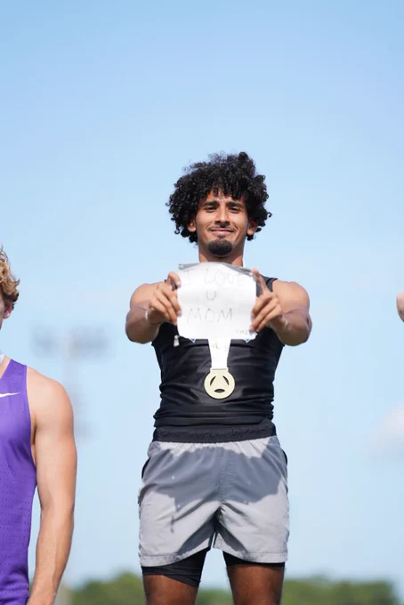 Kareem Nazim on the podium after winning pole vault