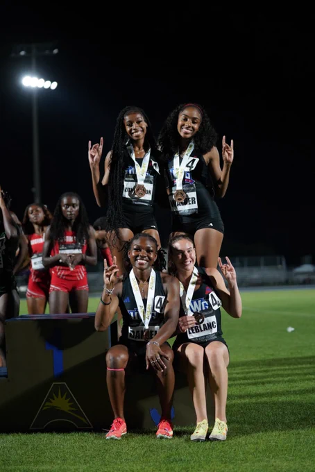 the uwg women’s 4x4 team on the podium at the asun championship