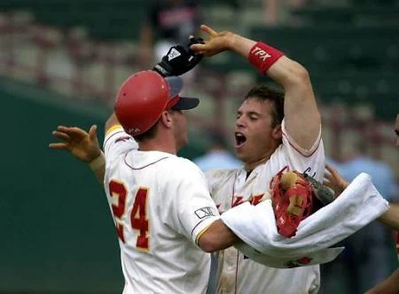 Iowa State's Joel Goedken (24) and Rob Conway celebrate after Conway hit a two-run single to win their Big 12 game against Baylor in Oklahoma City Thursday, May 17, 2001.
AP Photo/J. Pat Carter