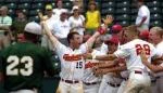 Iowa State batter Rob Conway (15) and his teammates celebrate as two runners cross home plate for the 6-5 victory over Baylor at the Big 12 tournament in Oklahoma City, Thursday, May 17, 2001. Baylor third baseman Matt Williams (23) heads to the dugout. AP Photo/J.Pat Carter