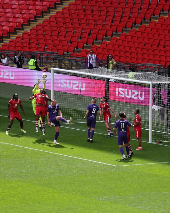 AFC Stoneham and Cockfosters battle it out during the Isuzu FA Vase Final.