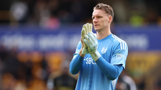 Bernd Leno applauds the away fans after the draw at Wolves.