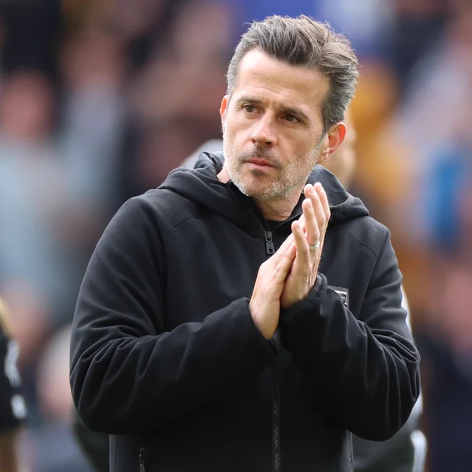 Marco Silva applauds the away fans after the draw at Wolves.