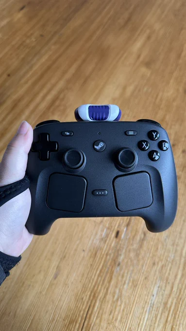 Photo of the new steam controller with the motorbunny fluffer attached