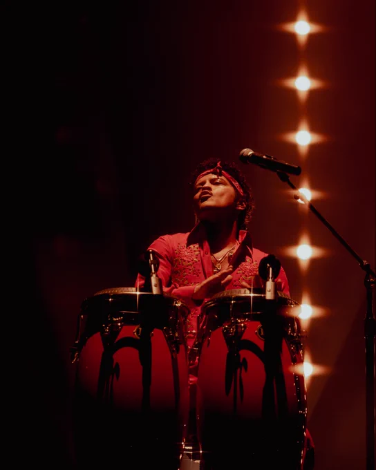 Bruno Mars playing bongos