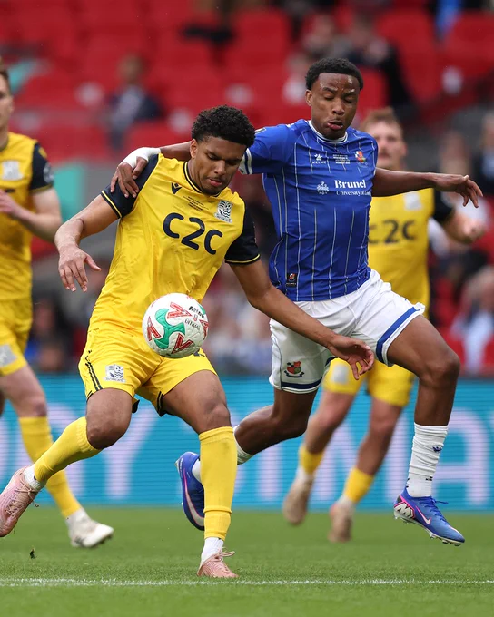 Southend United's James Golding is put under pressure by Wealdstone's Micah Obiero in the Isuzu FA Trophy Final.