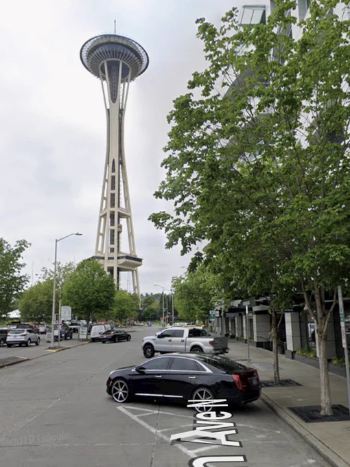 Google street view showing abandoned cars and wasted space.