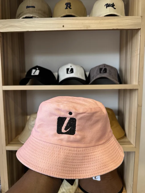 Pink bucket hat. UGX 30,000/=