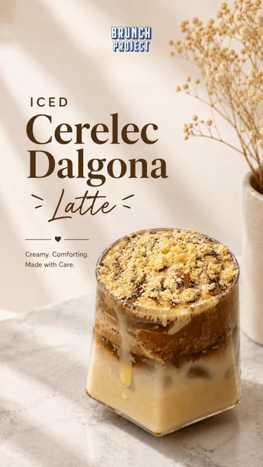 A premium iced Cerelac Dalgona Latte served at The Brunch Project café in Koramangala, Bangalore. The image features a creamy layered iced coffee drink in a modern transparent glass placed on a soft neutral-toned marble surface with warm natural lighting. The drink is topped generously with whipped dalgona foam, chocolate drizzle, crushed Cerelac crumble, and textured creamy layers flowing over the sides of the glass, creating a rich and indulgent visual. Elegant editorial typography reads “Iced Cerelac Dalgona Latte” with phrases like “Creamy. Comforting. Made with Care.” in a luxury café design aesthetic. Minimal beige styling, soft shadows, and dried floral décor in the background create a cozy Scandinavian-inspired brunch café mood. The overall visual communicates nostalgia, comfort, indulgence, and specialty coffee culture, highlighting one of The Brunch Project’s signature iced drinks in Bangalore.