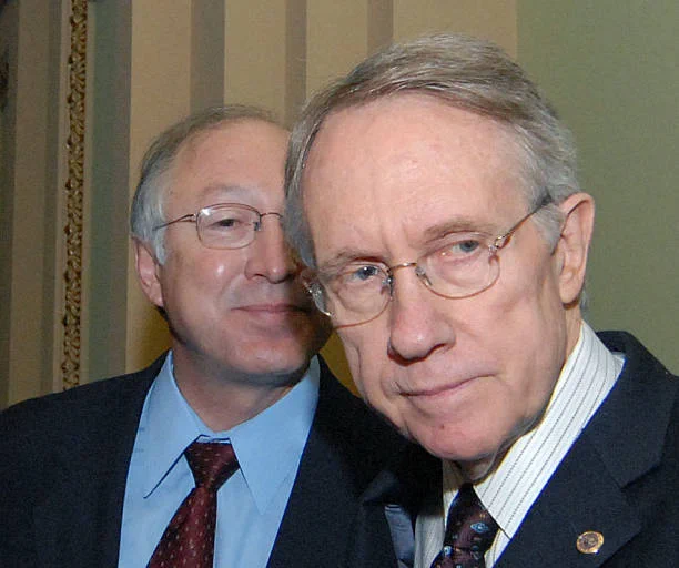 Ken Salazar (left) and Harry Reid (right)