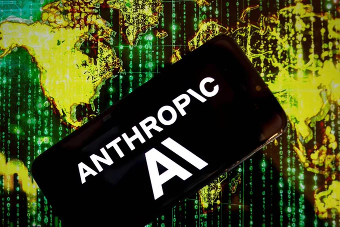 A smartphone displaying the Anthropic AI logo placed over a background of glowing green digital matrix code.