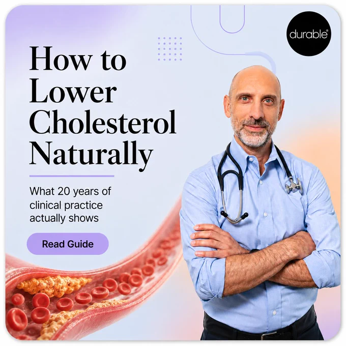 The image is an advertisement for a guide titled "How to Lower Cholesterol Naturally" by Durable. It features a person with crossed arms and a stethoscope, standing next to text mentioning the benefits of 20 years of clinical practice. An illustration of a blood vessel is also visible. A button reads "Read Guide."
