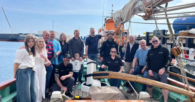 Fourteen people onboard a ship.