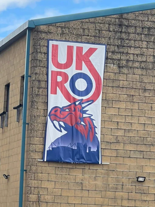 A UKRO flag with a dragon on it