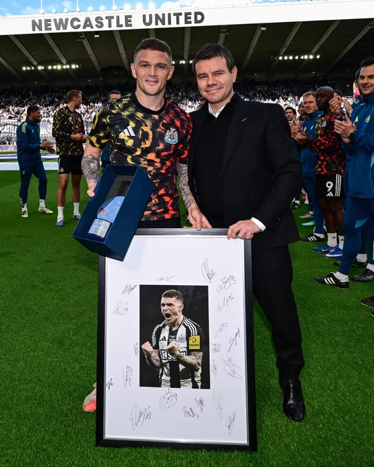 Kieran Trippier pictured with his award next to Ross Wilson. 