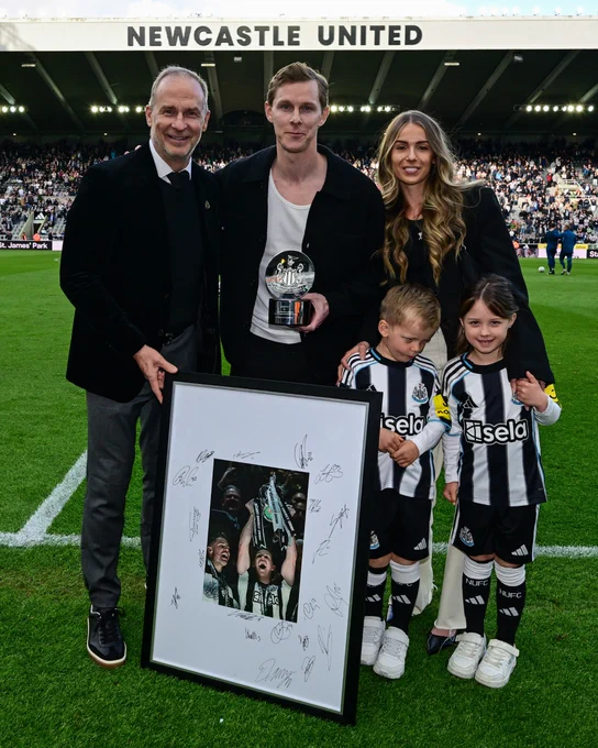 Emil Krafth pictured with his award, family and David Hopkinson. 