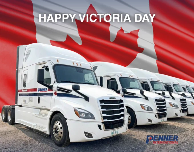 Penner International semi-trucks lined up beneath a waving Canadian flag graphic with “Happy Victoria Day” displayed across the top. The image celebrates Victoria Day and recognizes Canada’s trucking industry and drivers.