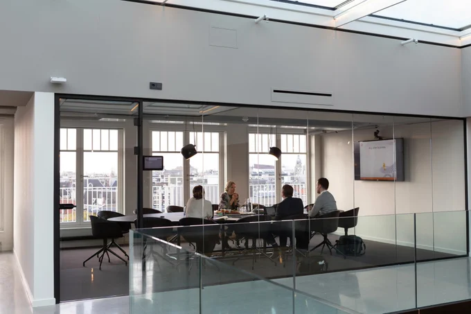 still urban office image to demonstrate collaborative professionals working together