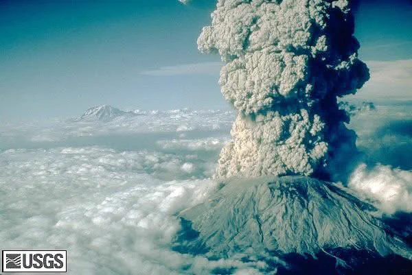 A massive cloud of ash bursts from the top of Mount St. Helens in 1980.