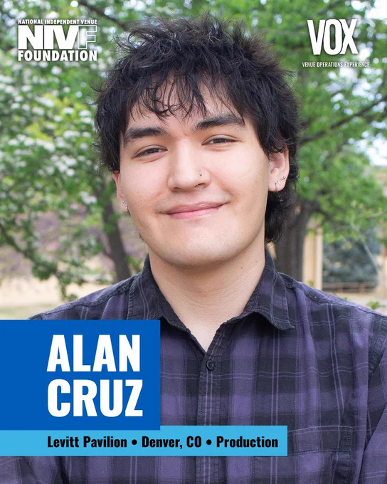 A portrait of Alan Cruz in an outdoor setting at Levitt Pavilion, Denver, CO, associated with production work. The mood is friendly and approachable.