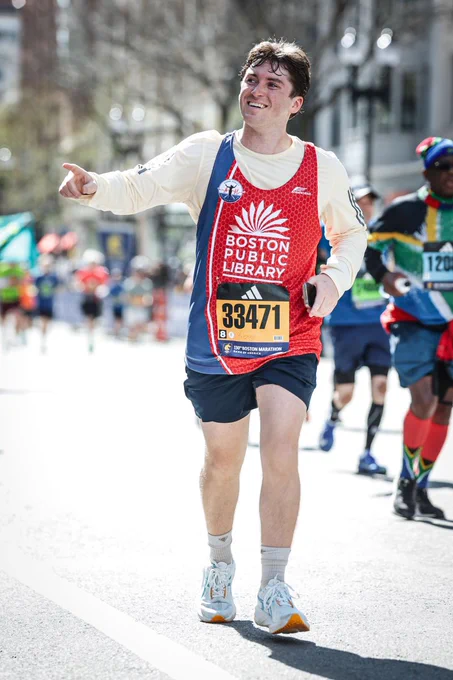An image of a Bain Capital colleague running in the 130th Boston Marathon.