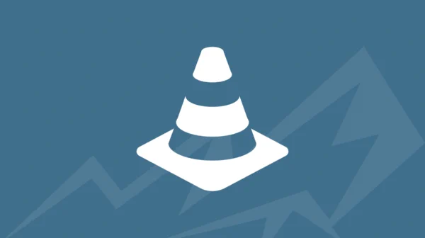 White traffic cone icon centered on a blue background with subtle zigzag patterns.