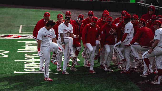 NC State baseball celebrating.