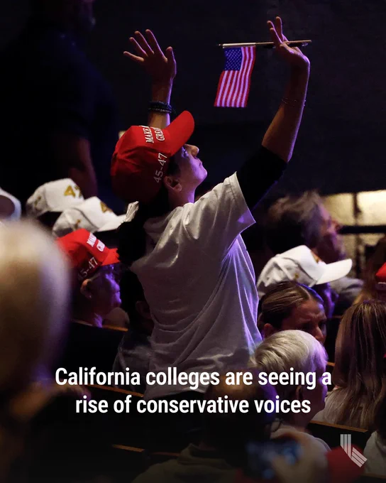 An attendee raises their arms during a Turning Point USA event at the University of California, Berkeley on Nov. 10, 2025. Two months after Turning Point USA founder Charlie Kirk was killed, the tour made a stop in California at UC Berkeley. Photo by Justin Sullivan, Getty Images