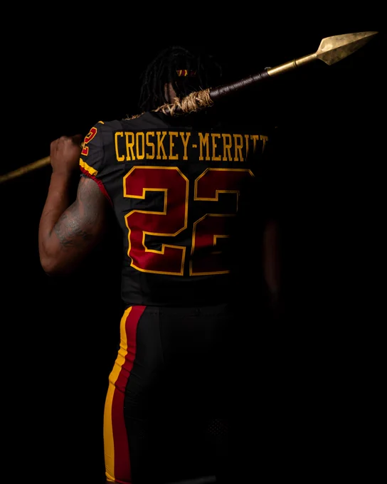 Photo of Bill Croskey-Merritt in our new black uniforms.