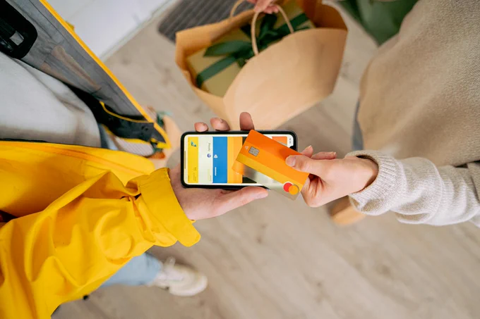 Photo by AI25.Studio  Studio from Pexels: https://www.pexels.com/photo/a-woman-paying-with-a-credit-card-6207703/