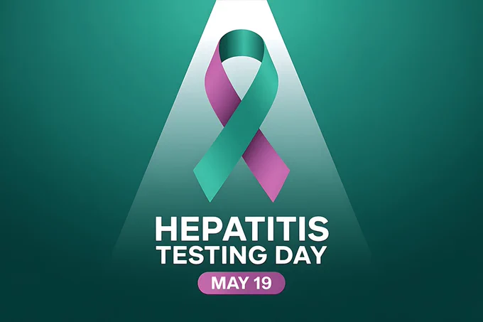 Green and purple awareness ribbon spotlighted with text Hepatitis Testing Day May 19 on background.