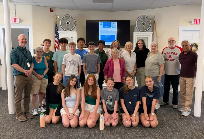 Pictured is a group of 8th grade students from NRMS, the Principal and Counselor.