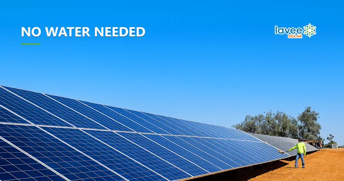 Large-scale solar farm with operator cleaning panels; text overlay says “NO WATER NEEDED” and Lavee Solar logo.