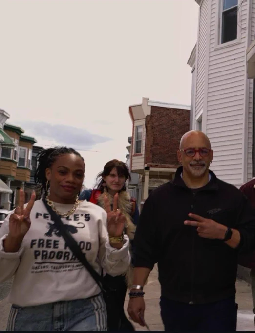 Me and Chris Rabb throwing peace signs on a Philly street 