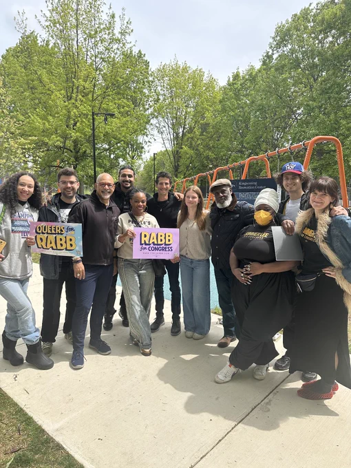A group picture of team Summer in a Philly park with Chris Rabb