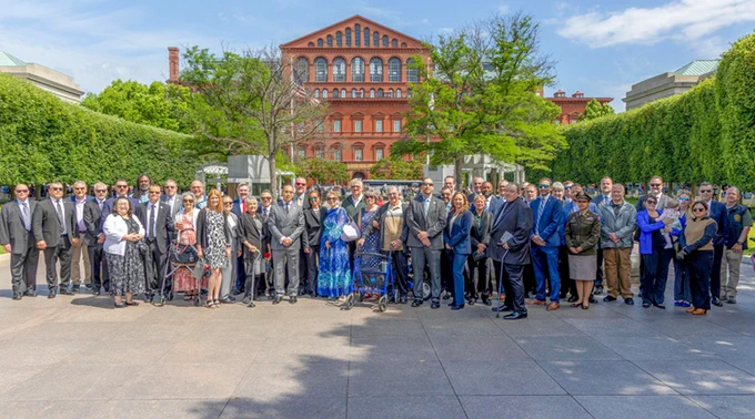Army CID joins guests to include law enforcement partners and familes of the fallen in a group photo at the National Law Enforcement Memorial, D.C. 