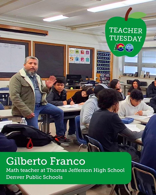 This image shows a math classroom at Thomas Jefferson High School, Denver Public Schools. A person, identified as Gilberto Franco, stands at the front, holding papers, and addresses students seated around tables. A "Teacher Tuesday" logo is in the upper corner.