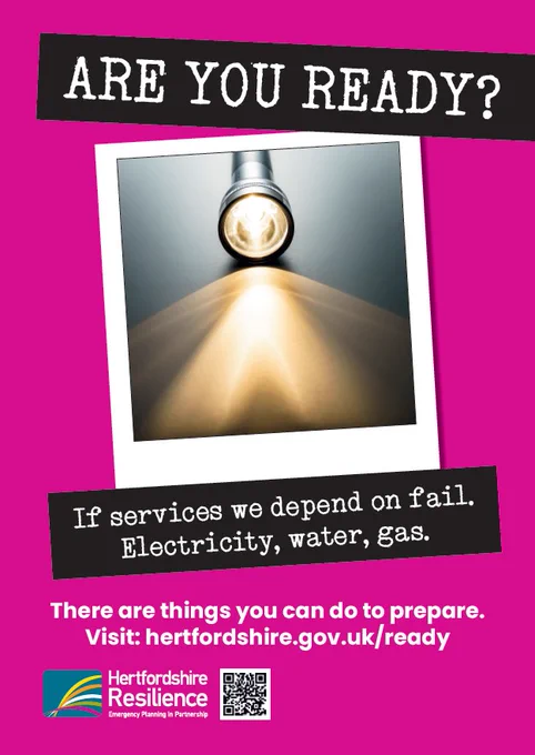 A lit flashlight casting a beam of light, with text about emergency preparedness.