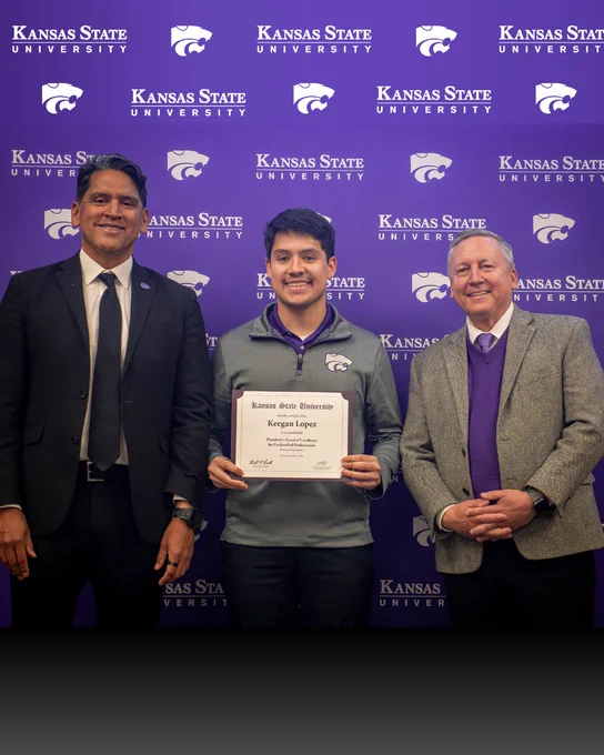 Keegan Lopez poses with Provost Jesse Perez Mendez and President Richard Linton after receiving the President’s Award of Excellence for Unclassified Professionals in the access and opportunity category.
