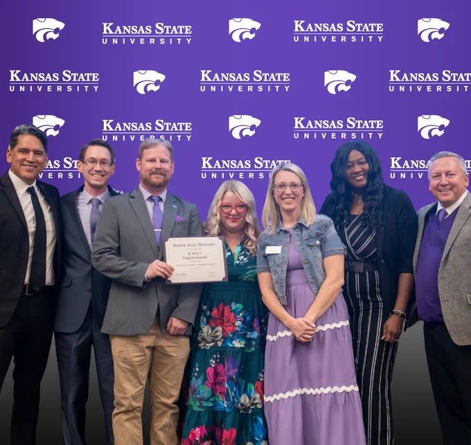 Jeff Sheldon poses with colleagues after receiving a joint award from the Office of External Engagement in recognition of their work supporting the K-State Digital Summit.