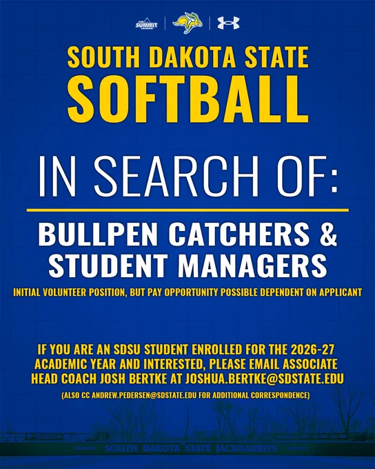 Graphic promoting South Dakota State University softball program recruiting. Blue background with yellow and white text and Summit League, Jackrabbit, and Under Armour logos at the top. Main text reads: “South Dakota State Softball. In search of: bullpen catchers and student managers.” Additional text states: “Initial volunteer position, but pay opportunity possible dependent on applicant.” Call to action: “If you are an SDSU student enrolled for the 2026–27 academic year and interested, please email Associate Head Coach Josh Bertke at joshua.bertke@sdstate.edu (also CC andrew.pedersen@sdstate.edu for additional correspondence).” Background includes a faint image of a softball field with “South Dakota State Jackrabbits” along the bottom.